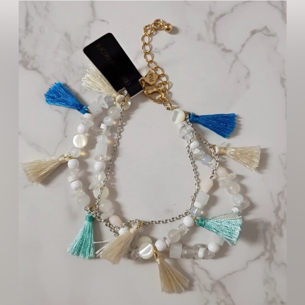 Rebecca Minkoff Layered Gold and Teal Tassel Turquoise Bracelet.